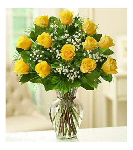 1 DOZEN YELLOW ROSES IN VASE WITH GREENS AND FILLER