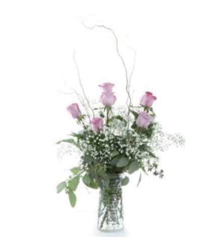 1/2 DOZEN PURPLE ROSES IN VASE WITH GREENS AND FILLER