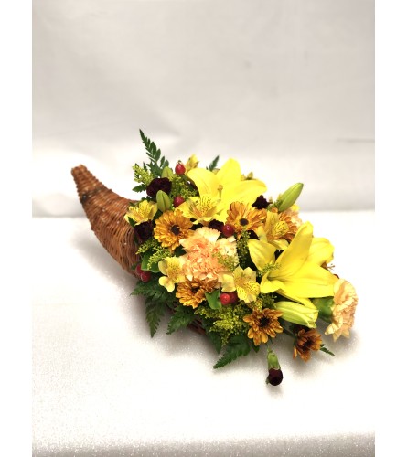 Cornicopia Centerpiece - Standard. An arrangement by Gonsalves-Fasso Flowers.