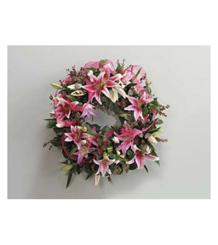 Lily and Eucalyptus Wreath. An arrangement by Enchanted Florist.
