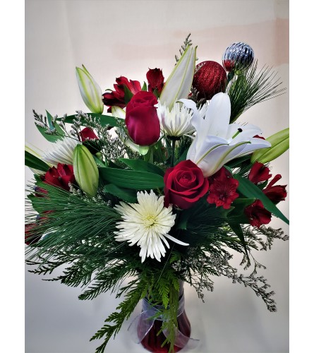 Holiday Classic. An arrangement by Flowers Plus.