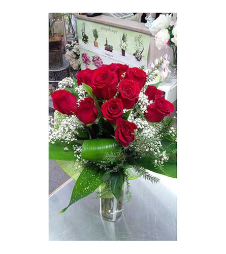 Modern red roses in vase