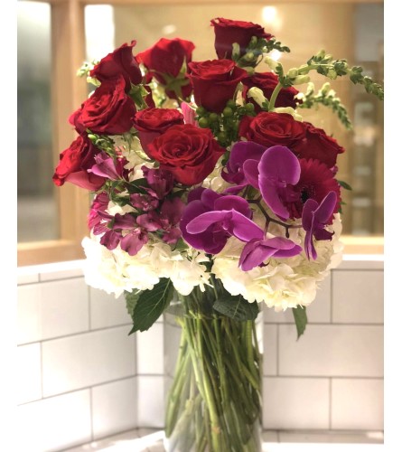 Elevated Dozen Roses Florals