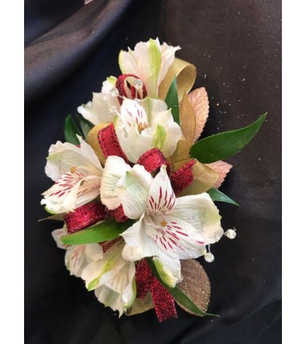 Spring Corsage - Deluxe. An arrangement by Kerman Floral and Gifts.