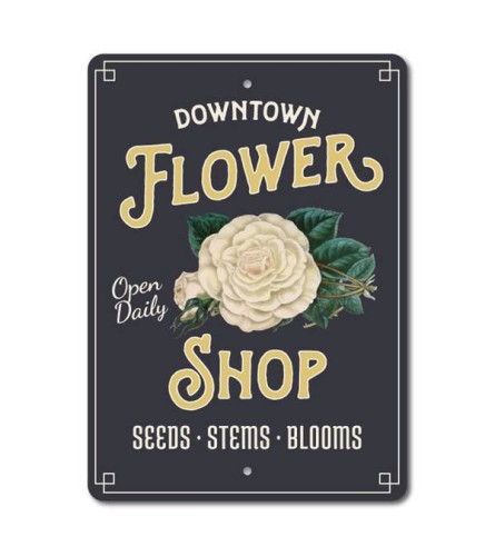 Downtown Flower Shop Sign. An arrangement by Thompson's Full Bloom.