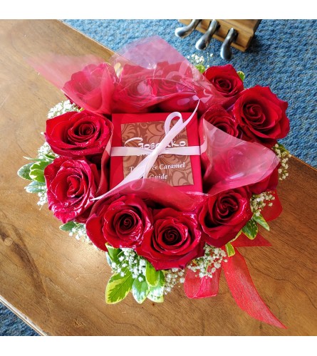 12 red roses in a heart shaped box with Gosanko truffles