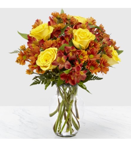 The FTD Golden Autumn Bouquet Vase Arrangement - Deluxe. An arrangement by Balloon Bouquets Plus.