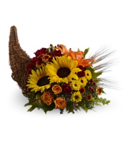 Teleflora's Heavenly Cornucopia Arrangement. An arrangement by Balloon Bouquets Plus.