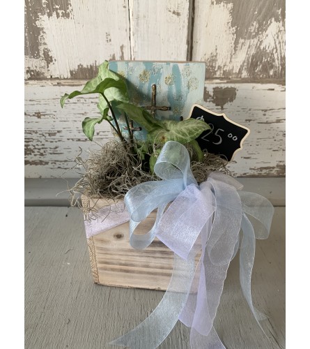 Wooden Box with Green Plant and Cross Sign