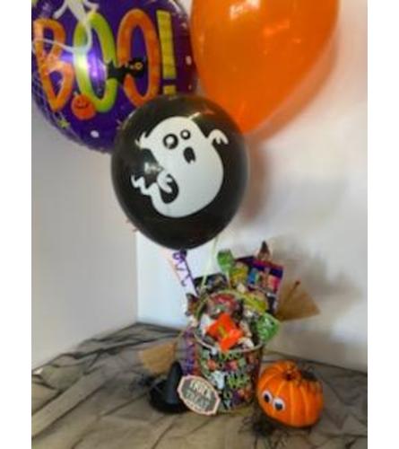 Halloween Treats Basket. An arrangement by Petals and Co..