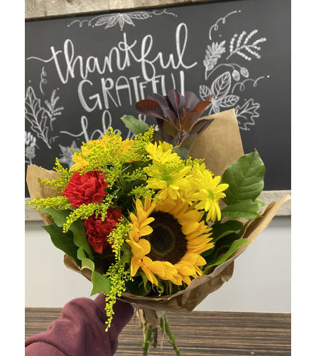 Fall Hand tied bouquet. An arrangement by Grande Prairie Florist.