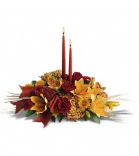 Red and Yellow Graceful Glow Centerpiece - Deluxe. An arrangement by Farmside Florist.