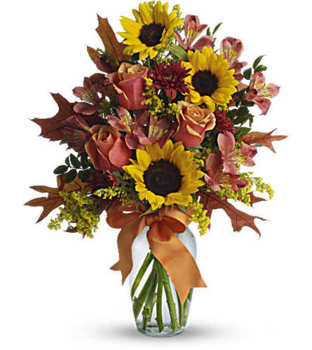 Warm Embrace Bouquet. An arrangement by Farmside Florist.
