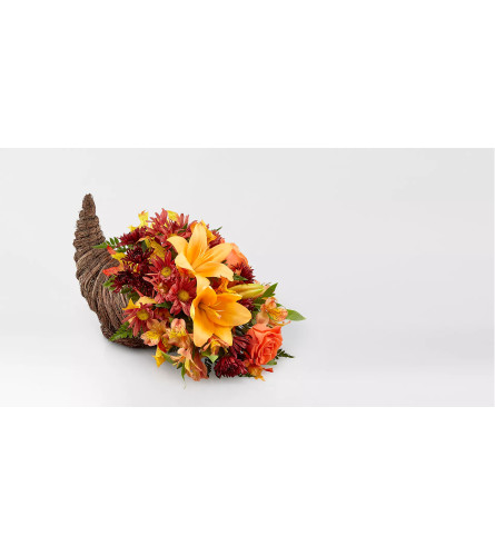THE HARVEST COMFORT CORNUCOPIA. An arrangement by Floral Insight.