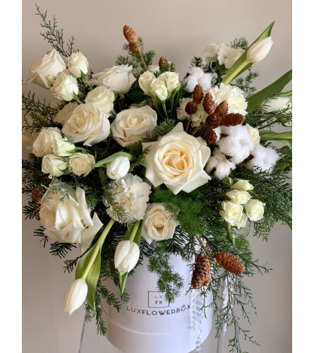 White Holiday. An arrangement by Lux Flower Box.