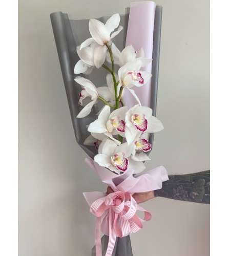 Mono Bouquet with white Orchids. An arrangement by Lux Flower Box.