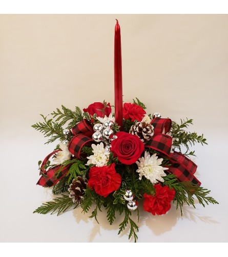 Happy Holiday greetings. An arrangement by Prestige Floral.