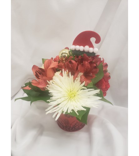Love of santa. An arrangement by Jane's Floral Dreams.