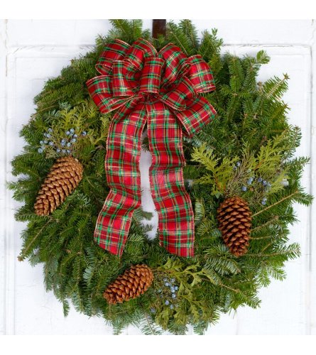 Fresh Wreath with Plaid Bow. An arrangement by The Greenhouse Florist.