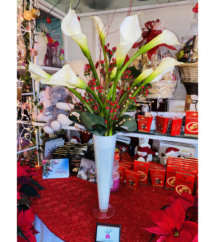Tall and Elegant. An arrangement by Sonia's Florist.