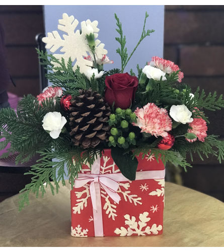 NO TIME LIKE THE PRESENT. An arrangement by Mayfield Flowers.
