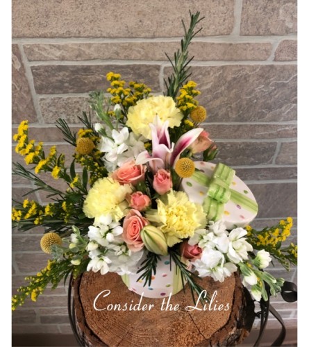 Celebrating your day. An arrangement by Consider the Lilies.