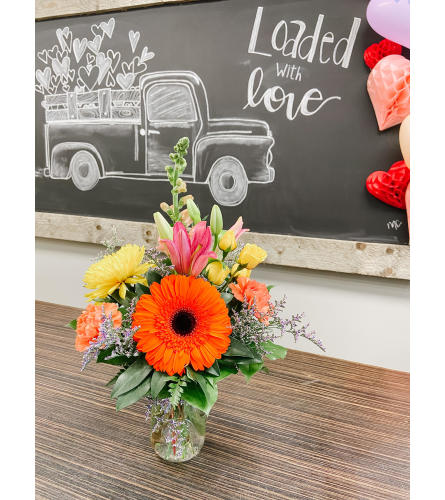 Spring essence. An arrangement by Grande Prairie Florist.