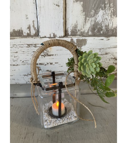 Tea Light Lantern. An arrangement by Metcalfe Florist and Pleasant View Greenhouses.