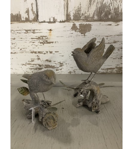 Bird Figures. An arrangement by Metcalfe Florist and Pleasant View Greenhouses.