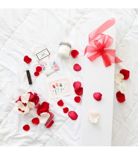 Red Hot Lovers Valentine's Day Package. An arrangement by The Studio at Barrie Flowers.