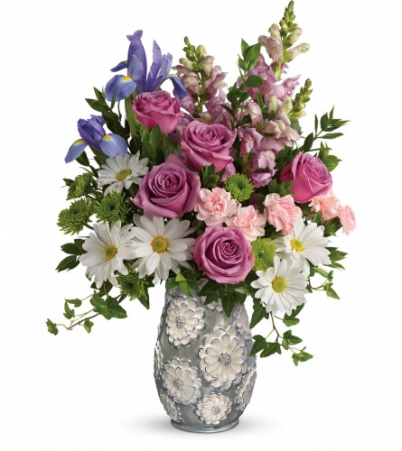 Teleflora's Spring Cheer - Deluxe. An arrangement by Sueppel's Flowers.