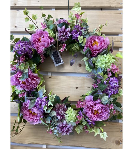 Mixed spring into summer door wreath