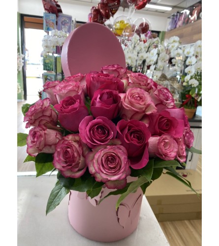 Pink As Roses. An arrangement by Flower World and Gifts.