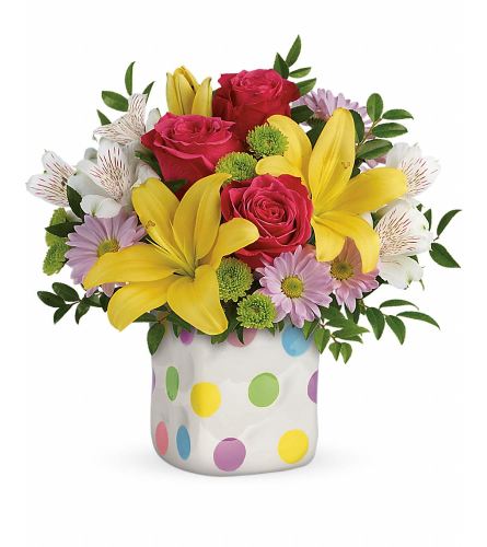 Teleflora's Delightful Dots. An arrangement by Fendley Florists.