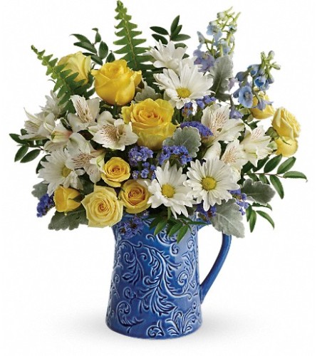 Bright Skies Bouquet (Teleflora) - Deluxe. An arrangement by North Liberty Flower Shop.