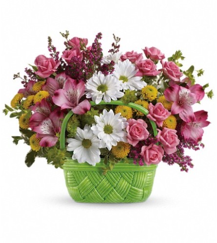 Basket of Beauty (Teleflora) - Deluxe. An arrangement by North Liberty Flower Shop.