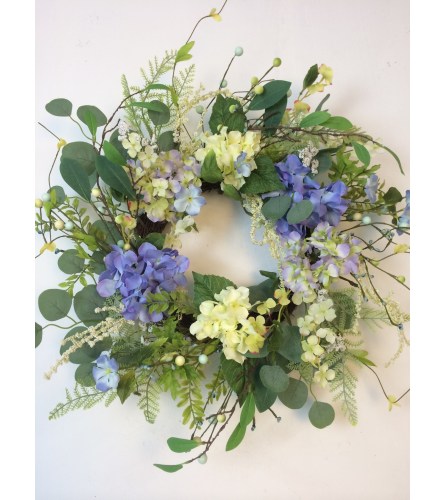 Spring Hydrangea Wreath. An arrangement by Forget Me Not Flowers and More.