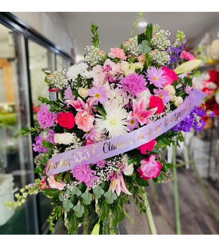Spray Lilac - Standard. An arrangement by Geni's Florist and Gifts.
