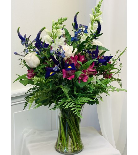 Serenity Floral Arrangement. An arrangement by Violeta's Flower Shop.