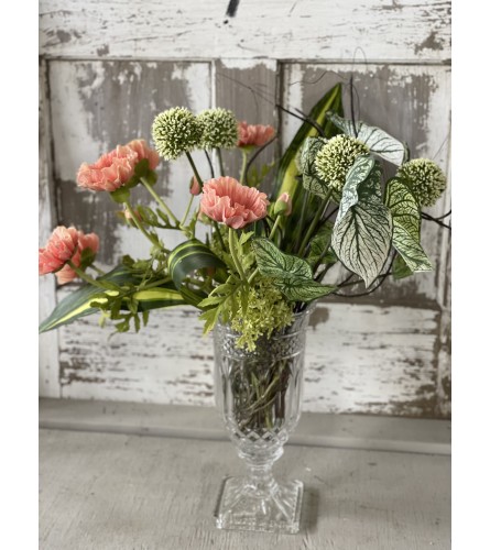 Crystal Centerpiece with Silk Florals and Greens. An arrangement by Metcalfe Florist and Pleasant View Greenhouses.
