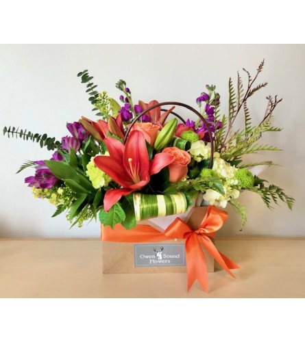 Gift bag of Blooms. An arrangement by Owen Sound Flowers.