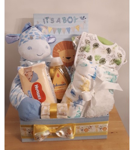 Welcome Home Baby Boy. An arrangement by Owen Sound Flowers.