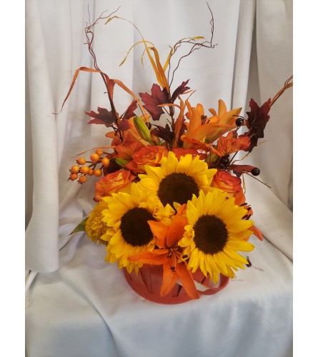 Warmth of autumn. An arrangement by Jane's Floral Dreams.