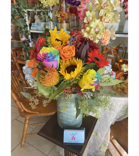 Autumn's Rainbow. An arrangement by Sonia's Florist.