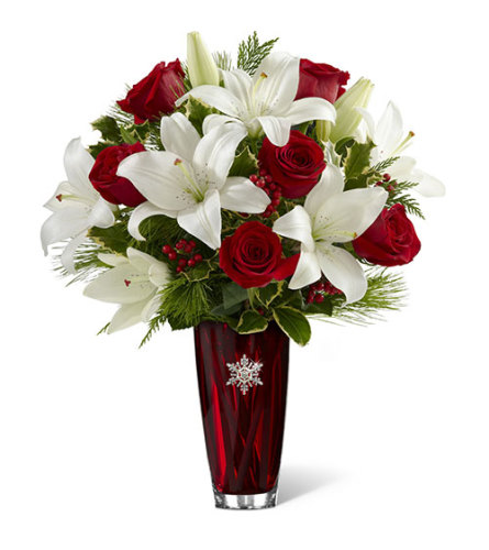 FTD Holiday Celebration - Deluxe. An arrangement by Fendley Florists.