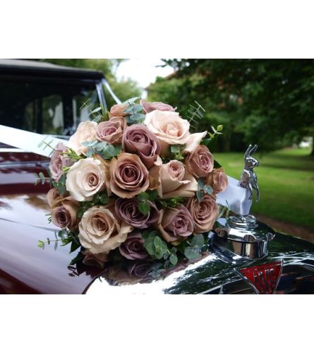 Amnesia Bride Bouquet. An arrangement by Geni's Florist and Gifts.