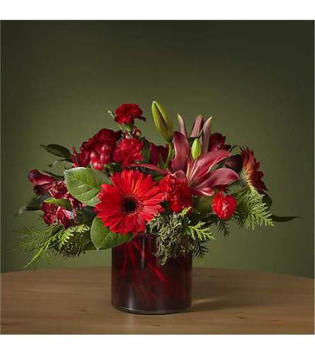 FTD Berry Merry Bouquet 2021. An arrangement by Merritt Florist.