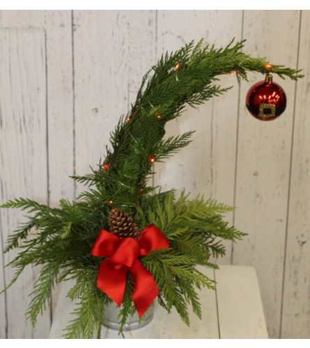 Jingle All The Way Grinch Tree. An arrangement by Red Rose Incredible Florist.
