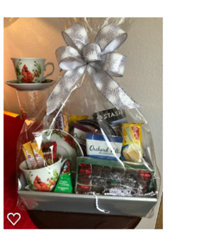 Tea Basket with Cardinal Cup and Saucer - Deluxe. An arrangement by Renton Flower Shop.