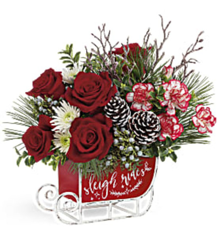 The Dashing Sleigh Bouquet - Deluxe. An arrangement by Flowers of Jacksonville.